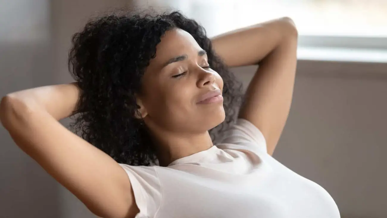 Woman relaxing to reduce anxiety and stress in her daily life